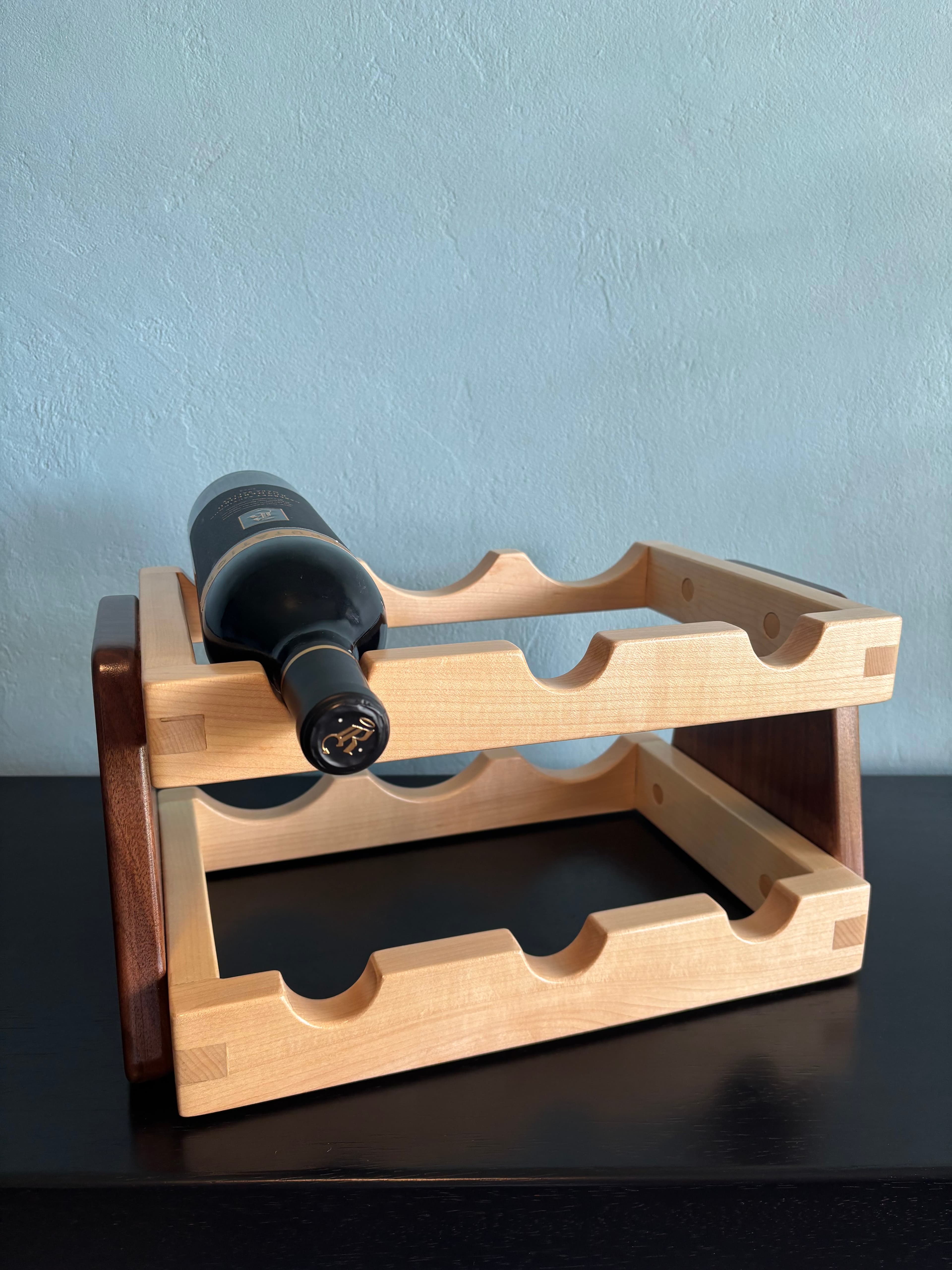 Maple and walnut rack with wine bottle